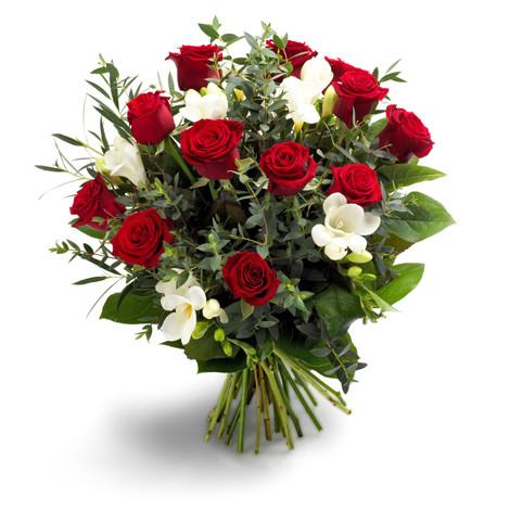 White alstroemerias blooms and red roses arranged perfectly in a round bouquet for Trinidad Tobago.